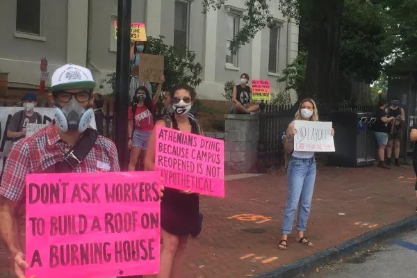 UGA union members assembled in front of the Arch to protest unsafe reopening conditions